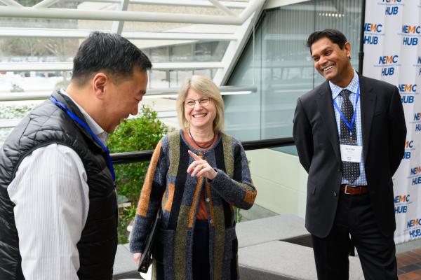 MIT President Sally Kornbluth (center) at the Northeast Microelectronics Coalition Hub Site with the founder and CEO of Headlamp Steve Chang (left) and the Vice President and General Manager of Applied Materials Aninda Moitra (right). 