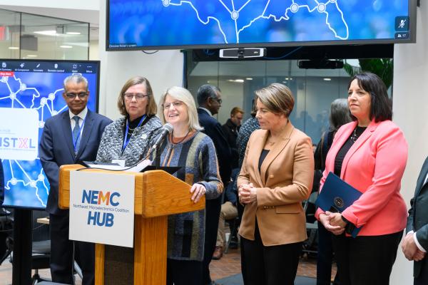 MIT President Sally Kornbluth (center) at the Northeast Microelectronics Coalition Hub Site with Dev Shenoy (far left), Carolyn Kirk (left), Governor Maura Healey (right), and Lieutenant Governor Kim Driscoll (far right). 